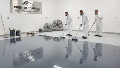 Epoxy floor coating in Beverly MA garage with durable glossy finish by local painting professionals