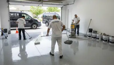 Epoxy garage floor coating in Beverly MA with durable, glossy finish by local house painters